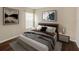 Cozy bedroom with warm lighting, sleek furniture, and neutral decor at 12620 Flatwood Creek Dr, Gibsonton, FL 33534