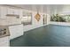 Lanai kitchenette with access to the outdoor space at 12620 Flatwood Creek Dr, Gibsonton, FL 33534