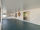 Spacious outdoor lanai features tiled kitchenette and sliding glass door at 12620 Flatwood Creek Dr, Gibsonton, FL 33534