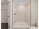 Modern shower featuring pebble flooring, rainfall shower head, and a glass enclosure at 12620 Flatwood Creek Dr, Gibsonton, FL 33534