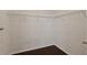 Empty walk-in closet area with wire shelving and hardwood floors at 12620 Flatwood Creek Dr, Gibsonton, FL 33534