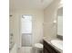 Clean bathroom with a tub/shower combo and tile flooring at 13181 Royal Pines Ave, Riverview, FL 33579