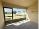 View of the backyard from the screened in porch at 13181 Royal Pines Ave, Riverview, FL 33579
