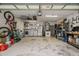 Spacious garage with laundry area, storage, and ample room for parking and projects at 1393 Chesterfield Dr, Dunedin, FL 34698