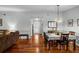 Spacious living and dining areas with hardwood floors and plenty of natural light at 1393 Chesterfield Dr, Dunedin, FL 34698
