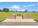 Expansive backyard view featuring a large grassy area and well-maintained landscaping at 13953 Thoroughbred Dr, Dade City, FL 33525