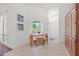 Bright breakfast nook with a small table, chairs, and natural light at 13953 Thoroughbred Dr, Dade City, FL 33525
