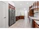 Kitchen showcasing stainless steel refrigerator and other stainless appliances at 13953 Thoroughbred Dr, Dade City, FL 33525