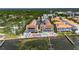 Overhead shot of waterfront condos with pool, lounge area, and access to pier at 1420 Bayshore Blvd # 409, Dunedin, FL 34698