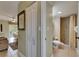 Inviting condo interior showcasing an open living space and a full bathroom with tiled walk-in shower at 1420 Bayshore Blvd # 409, Dunedin, FL 34698