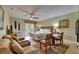 Cozy studio features a bed, a sitting area, and access to a balcony with exterior views at 1420 Bayshore Blvd # 409, Dunedin, FL 34698
