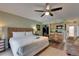 Comfortable studio bedroom features a kitchenette and a full-sized bed with soft linens at 1420 Bayshore Blvd # 409, Dunedin, FL 34698