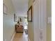 Hallway with a view into the main living space, as well as a 