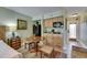 Convenient kitchenette area with wood cabinets, appliances, and adjacent dining area at 1420 Bayshore Blvd # 409, Dunedin, FL 34698