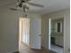 Bedroom featuring a standard closet and an ensuite bathroom at 1512 Chateaux De Ville Ct, Clearwater, FL 33764