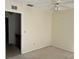 Neutral bedroom featuring carpeted floor, ceiling fan, and light-filled interior at 1512 Chateaux De Ville Ct, Clearwater, FL 33764