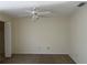 Spacious bedroom featuring neutral carpet, ceiling fan, and closet at 1512 Chateaux De Ville Ct, Clearwater, FL 33764