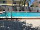 Beautiful community pool with landscaping at 1512 Chateaux De Ville Ct, Clearwater, FL 33764
