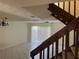 Open living area with tiled floor and staircase view at 1512 Chateaux De Ville Ct, Clearwater, FL 33764