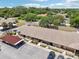 Aerial view of condo buildings showcasing the pristine landscaping and reserved parking at 1515 12Th Se Ct # 55, Largo, FL 33771