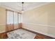 Dining room with hardwood floors and neutral paint and trim at 1515 12Th Se Ct # 55, Largo, FL 33771