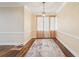 Dining room with hardwood floors, natural lighting, and neutral paint at 1515 12Th Se Ct # 55, Largo, FL 33771