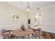 Cozy dining area with a round table, perfect for intimate meals and gatherings at 1515 12Th Se Ct # 55, Largo, FL 33771