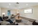 Spacious living room with hardwood floors, stylish furnishings, and plenty of natural light at 1515 12Th Se Ct # 55, Largo, FL 33771