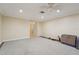 Cozy living room includes a ceiling fan and plush carpeting, with views into the hallway and adjacent rooms at 1515 12Th Se Ct # 55, Largo, FL 33771