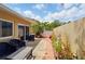 A backyard shows a small patio, some plants, and a fence at 1671 Cape Ann Ne Ave # 4, St Petersburg, FL 33702