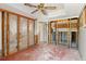 A bedroom with the walls open exposes the cinder blocks and wood frame construction at 1671 Cape Ann Ne Ave # 4, St Petersburg, FL 33702