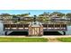 View of the waterfront dock in a serene private community with easy canal access at 1671 Cape Ann Ne Ave # 4, St Petersburg, FL 33702