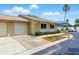Charming single-story home with a one-car garage, manicured bushes, and a well-maintained driveway in a desirable location at 1671 Cape Ann Ne Ave # 4, St Petersburg, FL 33702