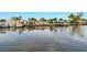 Scenic waterfront homes and boats with private docks along community canal at 1671 Cape Ann Ne Ave # 4, St Petersburg, FL 33702