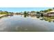 Scenic waterfront homes and boats with private docks along community canal at 1671 Cape Ann Ne Ave # 4, St Petersburg, FL 33702