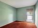 Bedroom featuring a window that allows ample natural light, neutral walls, and carpeted flooring at 18426 Sterling Silver Cir, Lutz, FL 33549