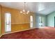 This dining room is bright with two windows and glass sliding door to outside at 18426 Sterling Silver Cir, Lutz, FL 33549