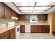 Full kitchen with ample counter and cabinet space at 18426 Sterling Silver Cir, Lutz, FL 33549