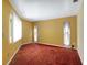 Bright living room featuring carpet and large windows at 18426 Sterling Silver Cir, Lutz, FL 33549