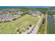A residential area with a view of the soccer field and tennis courts nearby, promoting a healthy and active lifestyle at 2321 Wood Pointe Dr, Holiday, FL 34691