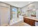 Bathroom featuring a sunken tub, tiled floors, a walk-in shower, rustic wooden paneling and a large mirror at 2321 Wood Pointe Dr, Holiday, FL 34691