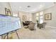 Inviting common area features comfortable seating, natural light, and stylish décor for community enjoyment at 2321 Wood Pointe Dr, Holiday, FL 34691