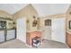 Hallway in the game room with bar, storage, shelving, and decor at 2321 Wood Pointe Dr, Holiday, FL 34691
