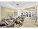 Comfortable lounge area with neutral colors, and plenty of natural light at 2321 Wood Pointe Dr, Holiday, FL 34691