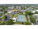 Expansive aerial view showcasing community amenities like tennis courts, pool, and recreational facilities at 2457 Ecuadorian Way # 63, Clearwater, FL 33763