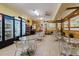 Bright and inviting cafe area with tables, chairs, snack machines, and retail offers a convenient spot to relax and enjoy at 2457 Ecuadorian Way # 63, Clearwater, FL 33763