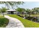 Beautiful community area with picnic shelter and walking path along the pond at 2457 Ecuadorian Way # 63, Clearwater, FL 33763
