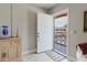 Inviting entrance with open front door and view to the exterior at 2457 Ecuadorian Way # 63, Clearwater, FL 33763