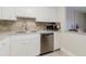 Close up of the kitchen featuring granite countertops and stainless steel appliances at 2457 Ecuadorian Way # 63, Clearwater, FL 33763