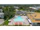 Beautiful outdoor pool area with ample seating for residents to relax and enjoy the sun at 2457 Ecuadorian Way # 63, Clearwater, FL 33763